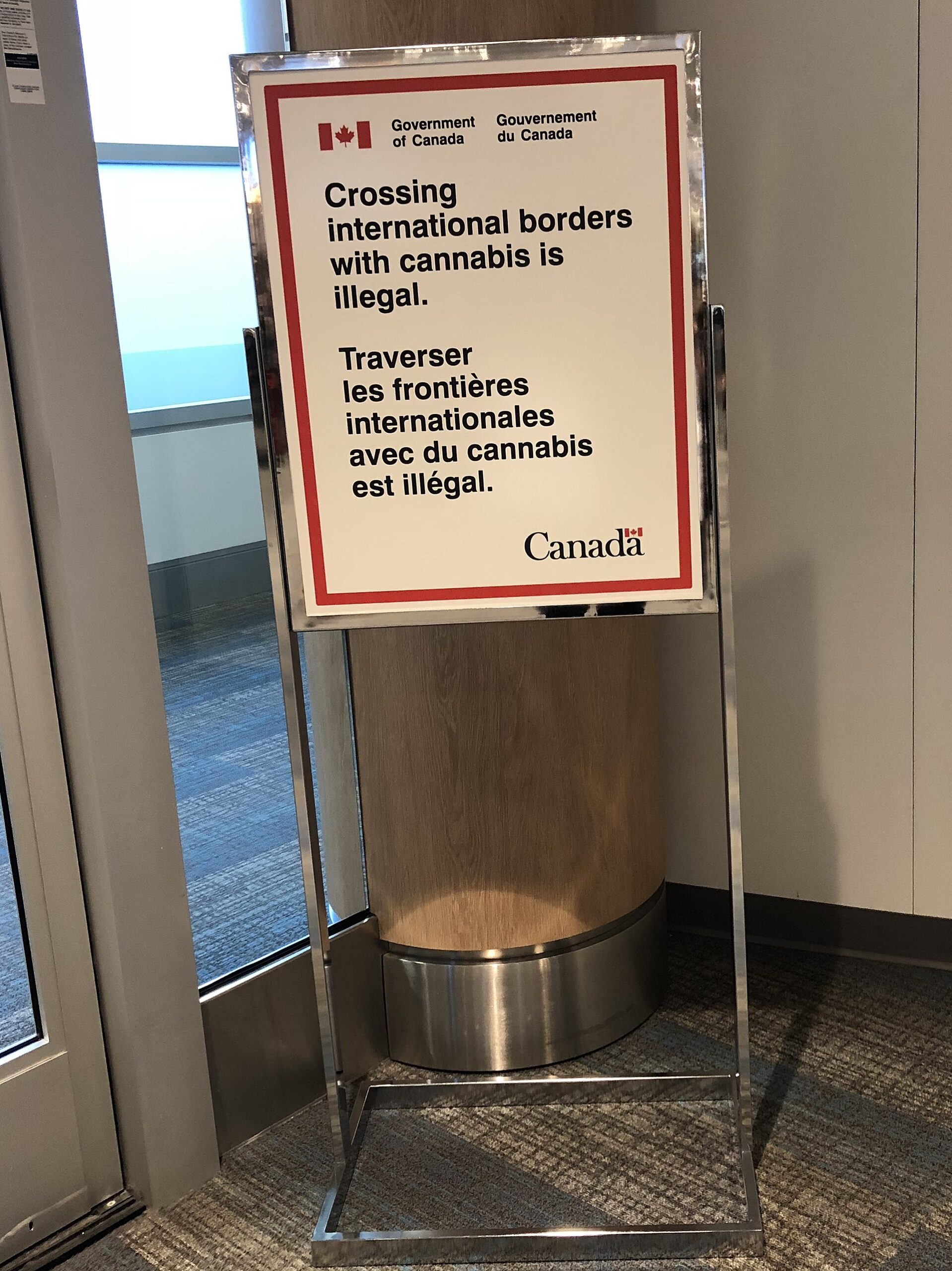 Government of Canada (Gouvernement du Canada) cannabis sign at Billy Bishop Toronto City Airport (YTZ) gate on 19 October 2018