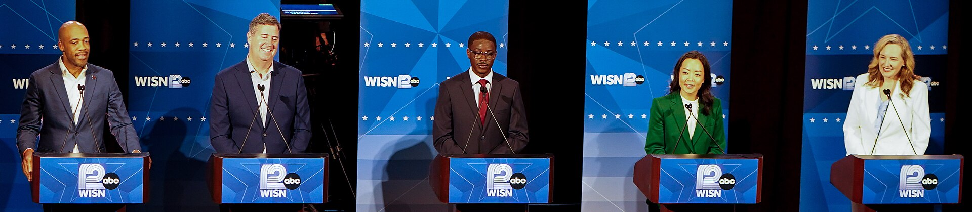 Mandela Barnes, Joel Brennan, David Crowley, Francesca Hong, and Kelda Roys during Democratic Primary debate on July 28, 2026