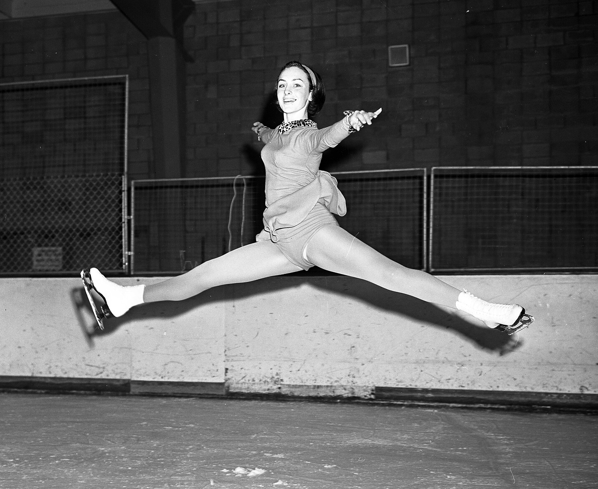 Peggy Fleming practicing jump for national title, 1965