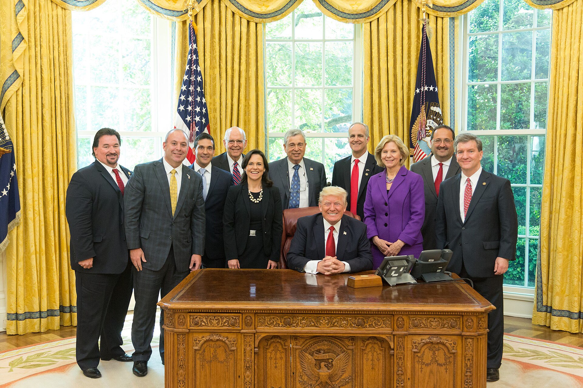President Donald Trump meets with Michigan Republican Party Chairman, Ron Weiser