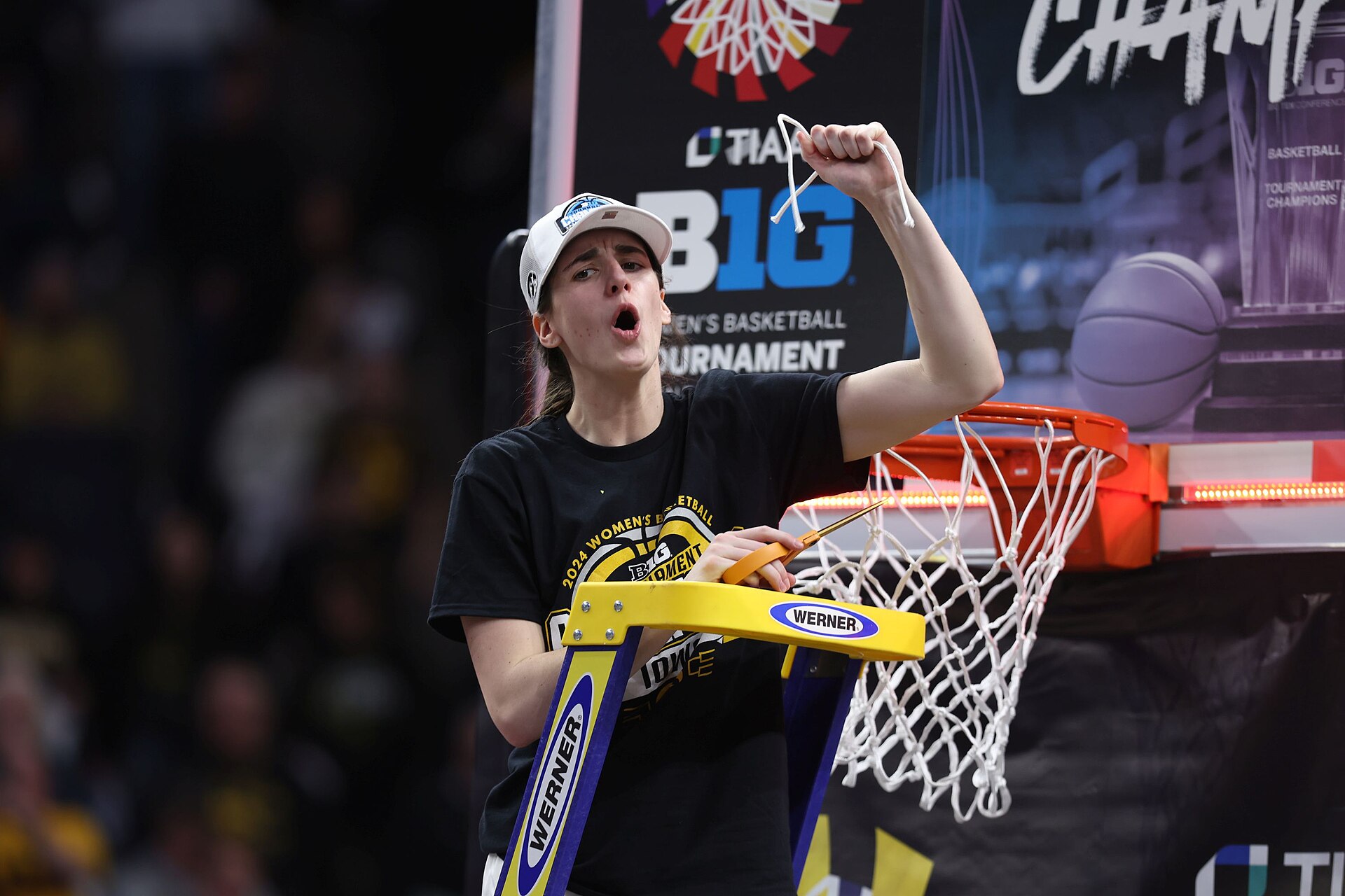 Caitlin Clark cutting down net during postgame celebration by Iowa State team after the 2024 Big Ten women&amp;#39;s basketball tournament final 445 (53579376981)