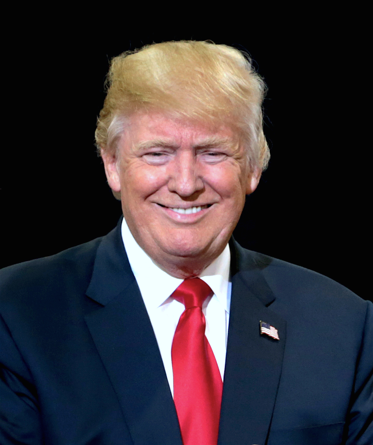 Donald Trump speaking with supporters at a campaign rally at the Phoenix Convention Center