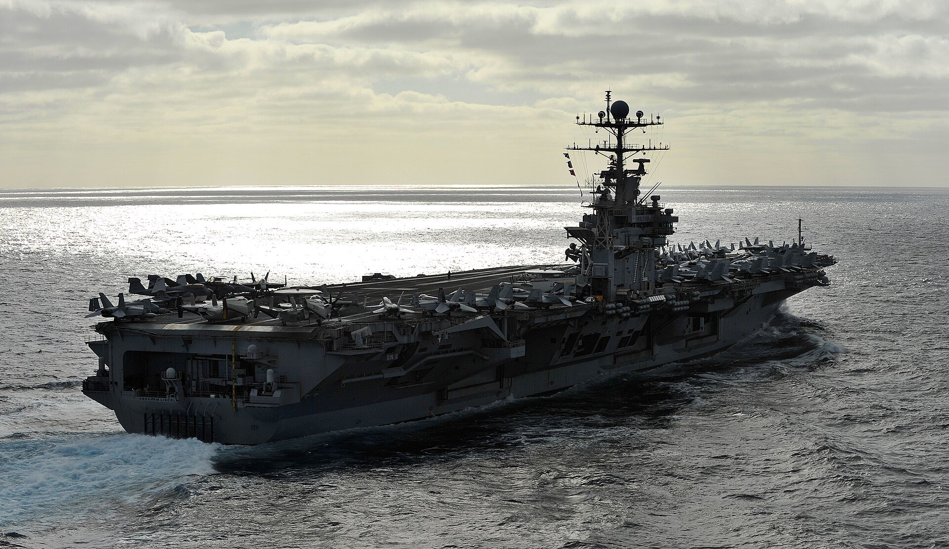 US Navy 111216 N KQ416 328 The Nimitz class aircraft carrier USS Abraham Lincoln (CVN 72) is underway on deployment to the 5th and 7th Fleet areas