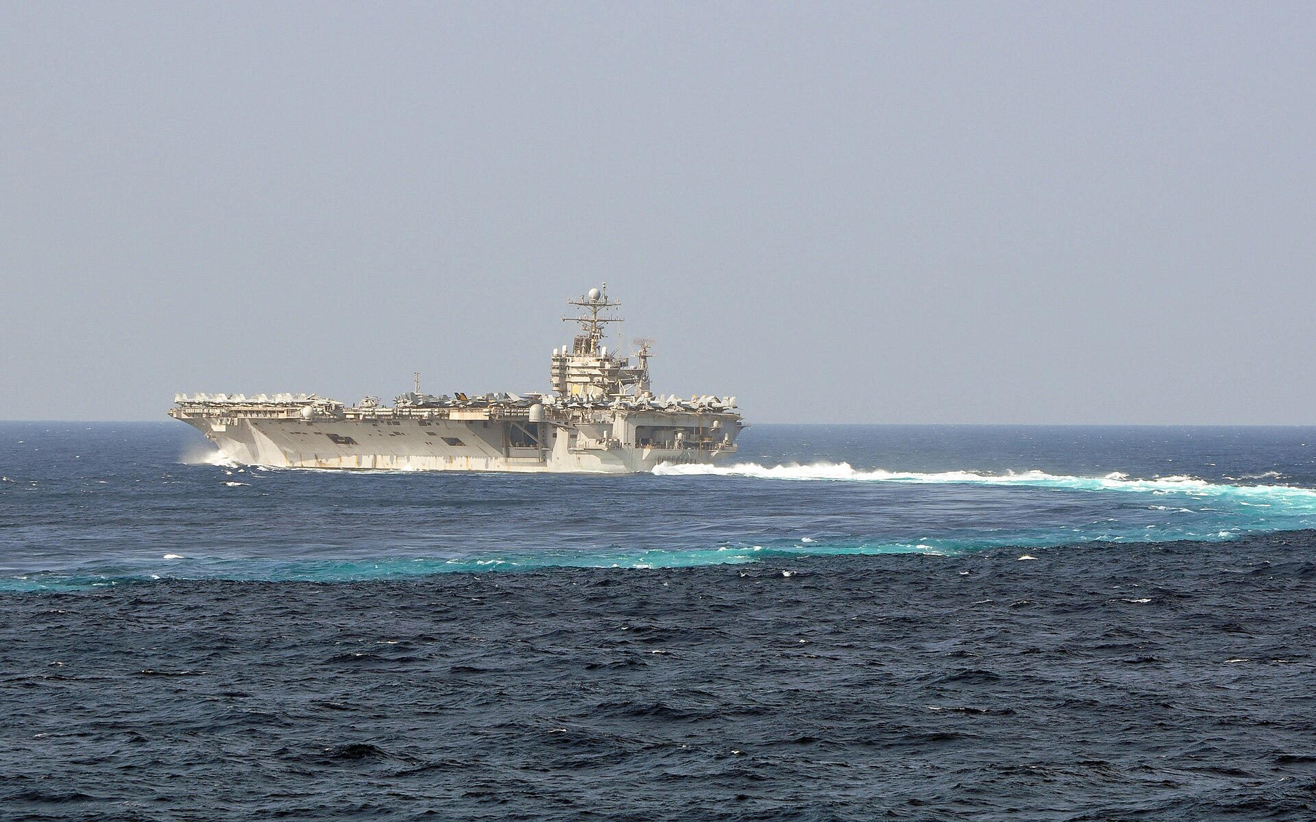 US Navy 110127 N 8369A 041 The aircraft carrier USS Abraham Lincoln (CVN 72) maneuvers through a turn
